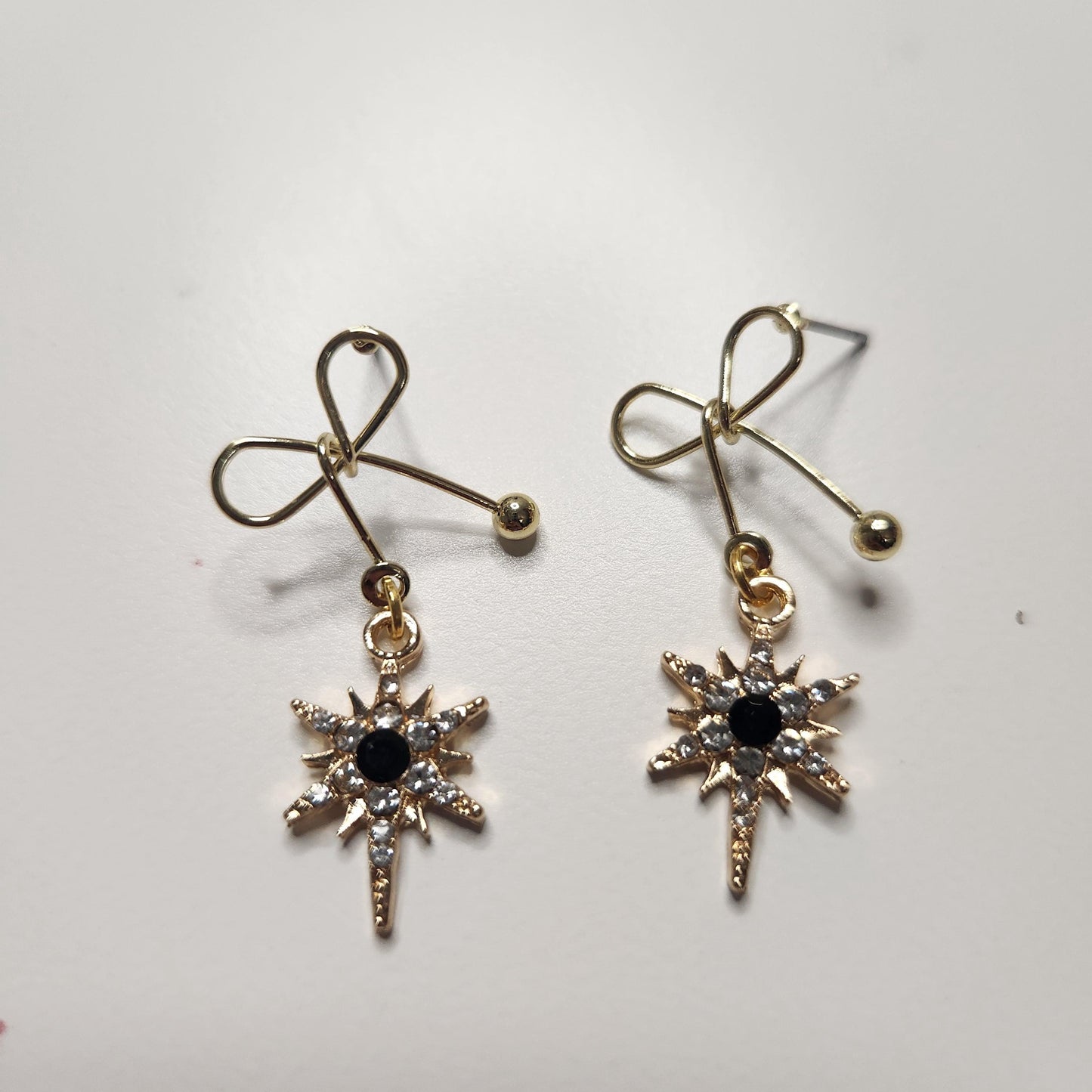 HANDMADE tarnish free gold plated diana bow earrings with black star dangle